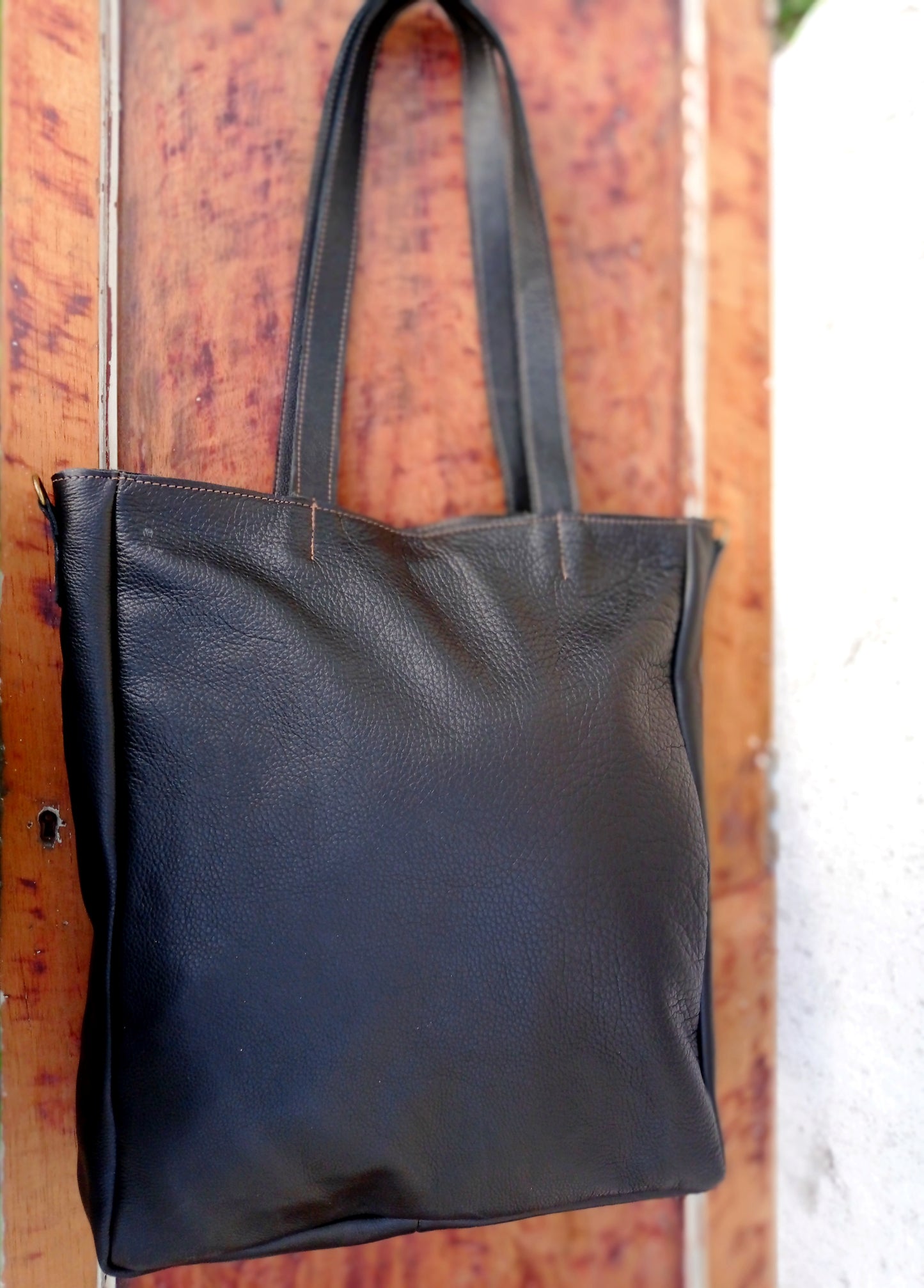 CARTERA BRUNA EN CUERO LISO